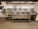 Three compartment stainless steel sink with hand