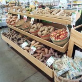 three-tiered dry produce merchandising racks