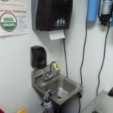 hand sink w/ soap & towell dispenser