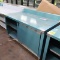 stainless table w/ backsplash & cabinets under