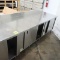 stainless table w/ cabinets under