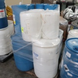 pallet of plastic barrels