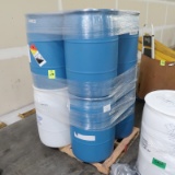 pallet of plastic barrels