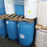 pallets of plastic barrels