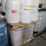 pallets of plastic barrels