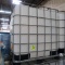 large plastic containers in steel cages