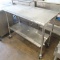 stainless table w/ undershelf, on casters