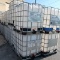 large plastic containers in steel cages