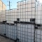 large plastic containers in steel cages