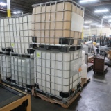 large plastic containers in steel cages