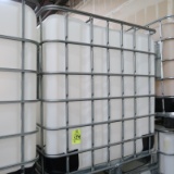 large plastic containers in steel cages