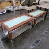 short merchandising tables w/ cracked glass, on casters