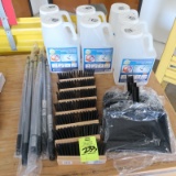 cleanning supplies: brushes, dust pans, refillable bottles