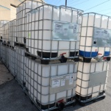 large plastic containers in steel cages