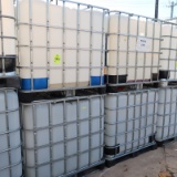 large plastic containers in steel cages