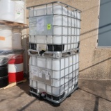 large plastic containers in steel cages