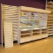 wooden merchandising counter w/ solid surface top