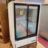 True 2-glass-door checkstand refrigerator, on crates