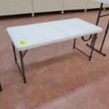 folding table w/ plastic top & adjustable height