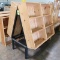 angled merchendiser: steel frame w/ wooden shelves