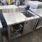 stainless table w/ backsplash & single compartment sink