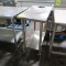 stainless table w/ undershelf on casters w/ dump hole