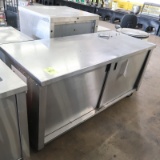 stainless table w/ cabinets under