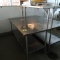 stainless table w/ under- and over-shelf