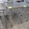 stainless table w/ wire shelves, on casters