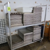 aluminum cooler rack, on casters, full of sheet pans