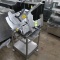 Bizerba deli slicer, on stainless deli caddy stand