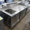 stainless table w/ built-in sink, backsplash, & cabinets under