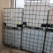 plastic containers in steel cages- IBC totes