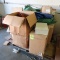 pallet of assorted medical supplies: sample containers, syringes, tarps, etc