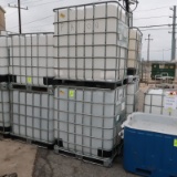 plastic containers in steel cages- IBC totes