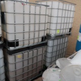 plastic containers in steel cages- IBC totes