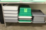 Group of plastic totes and lids