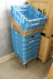Group of produce stocking crates and dolly