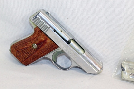 JENNINGS FIREARMS .22 CAL HANDGUN MODEL J-22 AND EMPTY MAGAZINE