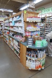 wooden shelving island, mirrored w/ glass shelves one side