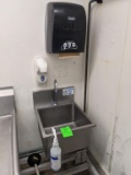 Stainless sink with paper towel and soap dispenser