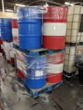 Pallets of Steel and Plastic Barrels