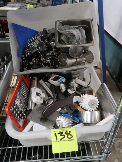 tub of assorted kitchen tools
