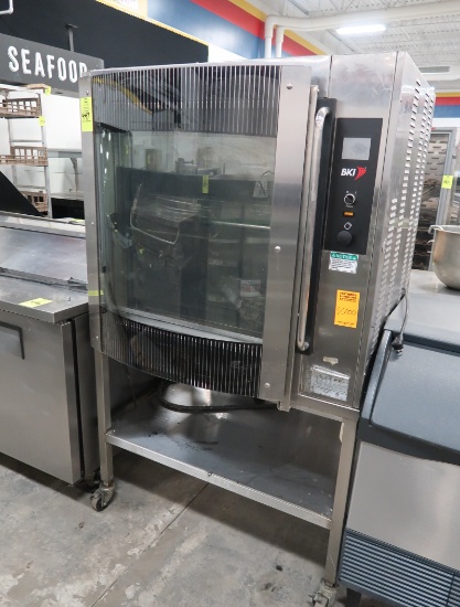 BKI electric rotisserie on stand, w/ spits