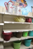 Group Of Pots And Watering Cans