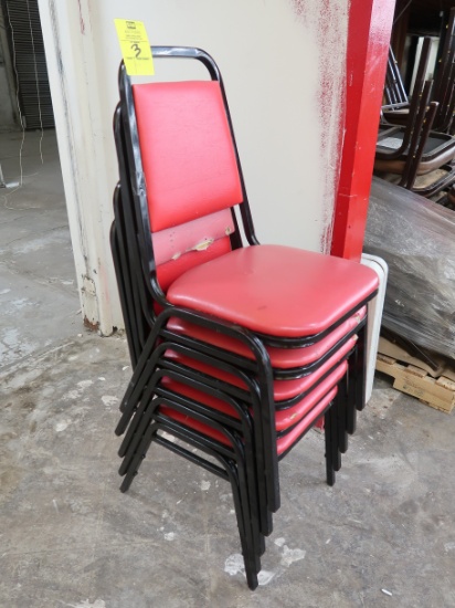 stack of padded stackable chairs