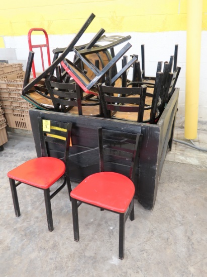 crate of wooden chairs