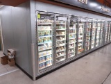 walk-in freezer, w/ 8) glass merchandising doors w/ racks & floor