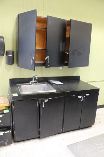 Floral Millwork And Cabinets W/ Soap And Paper Towel Dispenser