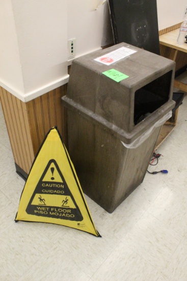 Trash Can And Wet Floor Sign